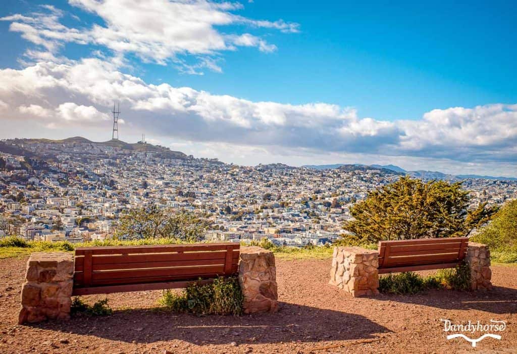 A breathtaking view of San Francisco from Bernal Heights Park, showcasing the city skyline and surrounding nature.