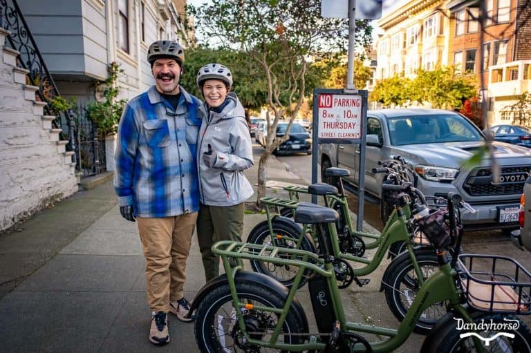 Couple exploring San Francisco on e-bikes