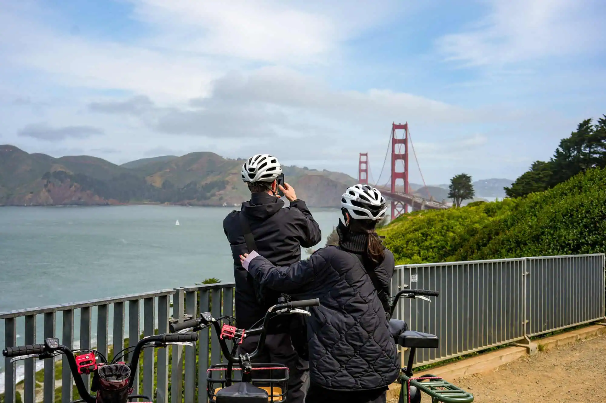 The Ultimate Electric Sf Bike Tour 7 Cyclists photographing golden gate bridge overlook on san francisco e-bike tour