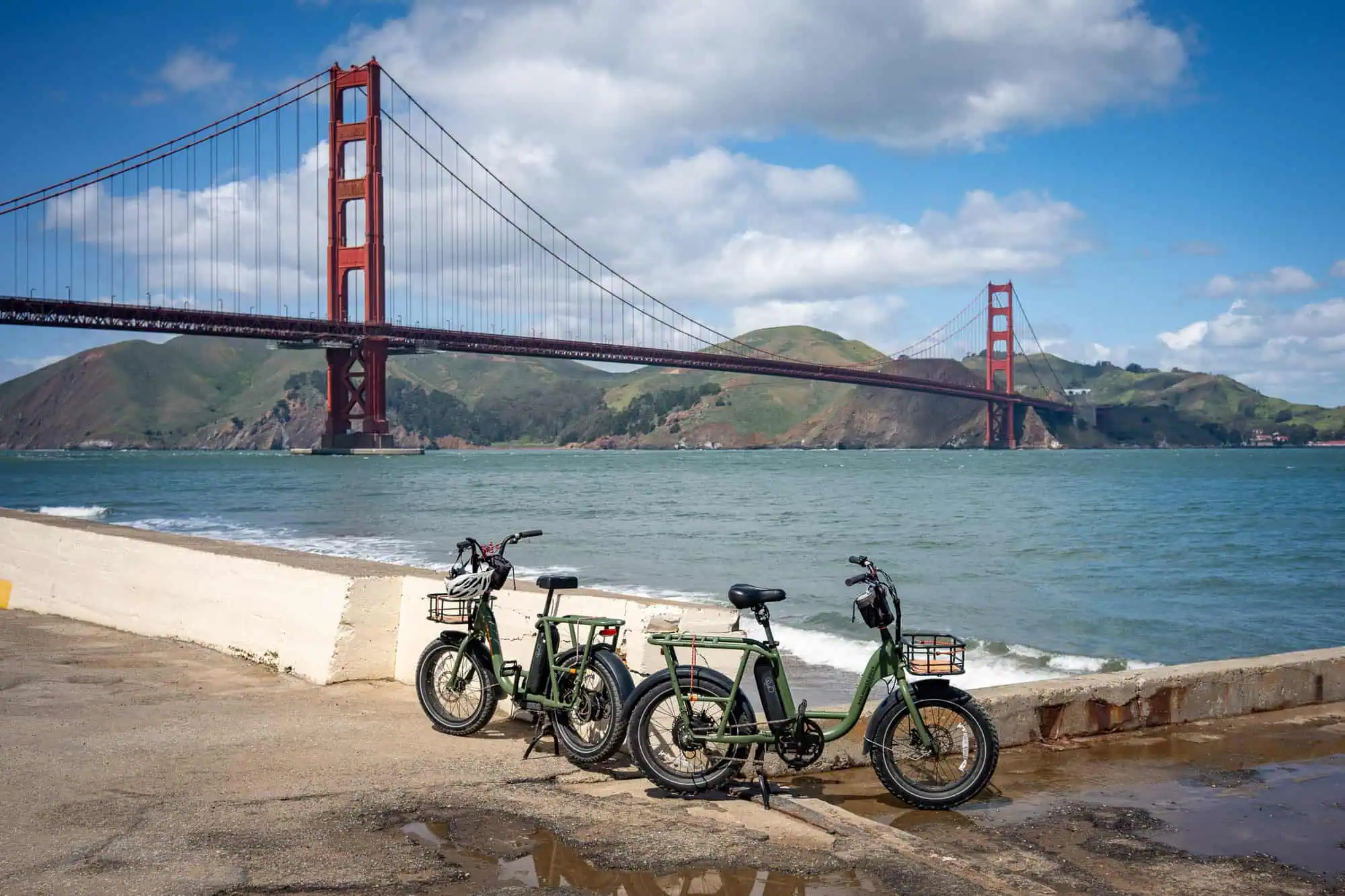 Electric Bike Rental San Francisco - Radpower Bikes Sf 7 Two premium e-bikes parked at beach with golden gate bridge view san francisco rental